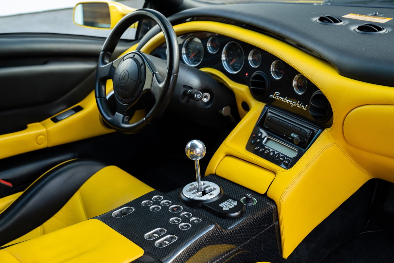 Yellow leather cabin and gated shifter, Lamborghini Diablo